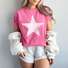 Loving this! Star Shirt Oversized Comfort Colors Tee with a Preppy Aesthetic Tshirt.  The perfect Indie Gift for Her and Fun in the Sun Star Tshirt! Great Gift Idea for a Preppy Girl with this Cute Beach Coverup.  Fun in the Sun!  𝐏𝐑𝐎𝐃𝐔𝐂𝐓 𝐃𝐄𝐓𝐀𝐈𝐋𝐒 🌸Comfort Colors 1717 Tee 🌸100% ring-spun US cotton. 🌸Medium fabric (6.1 oz/yd² (206.8 g/m  🌸Relaxed fit. Please check size chart. 🌸Pre-shrunk fabric.   🌸Signature sewn-in twill label. 🌸Double-needle stitching throughout.  No side se Casual Short Sleeve T-shirt With Star Logo, Trendy Summer T-shirt With Star Patch, Summer Crew Neck T-shirt With Star Print, Graphic Tee With Star Logo For Summer, Summer Cotton T-shirt With Star Patch, Crew Neck Tops With Star Logo For Summer, Oversized Star Print Summer Tops, Cute Short Sleeve T-shirt With Star Print, Trendy Star Print Summer Tops