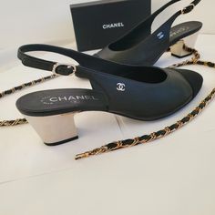 Authentic Chanel Black Leather Slingback W. Metal Silver Heel In Gently Preloved Condition. Please Check Photos Carefully, I Tried To Take Pics Of Every Noticeable Flaws. Leather Shows Visible Signs Of Wear (Where It Folds); Bottom Shows Visible Scuffing, 1 Scratch On One Of The Heels Only Visible If You Look Very Hard In Direct Sunlight... Box And Chain Are Not Included In Price Comes Without Dustbag Or Box No Pets, Non-Smoking Home It's An Amazing Classic Silver Heel, Silver Heels, Chanel Black, Chanel Shoes, I Tried, Black Silver, Dust Bag, Black Leather, Chanel