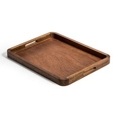 an empty wooden tray on a white background