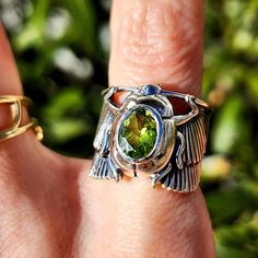 Absolutely enchanting Peridot Scarab Finger Cuff in .925 Sterling Silver. Adjustable ring fits sizes 5-10. This beautiful, high quality Peridot was hand picked with intention just for you by Rick and Jamie, and set into our newest custom designed adjustable sterling silver setting. Scarabs were used in ancient Egypt as talismans, symbols of protection, resurrection and manifestation. Ancient Egyptians adored Scarabs for good luck, using them in blessings and magical spells. Scarabs were associat Magical Spells, Finger Cuff, Ancient Egyptians, Ring Fit, Ancient Egyptian, Adjustable Ring, Ancient Egypt, Hand Picked, Adjustable Rings