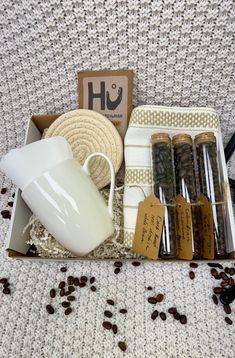 a box filled with coffee beans and other items to make it look like someones