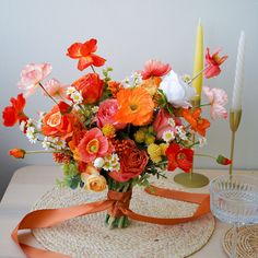 a bouquet of flowers is sitting on a table