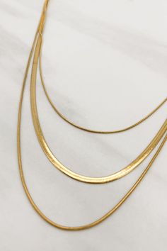 Three Strand Gold or Silver Plated Snake Chain Necklace Modern Multi-strand Gold Jewelry, Modern Gold Multi-strand Jewelry, Trendy Gold Snake Chain Layered Necklace, Gold Double Chain Snake Necklace For Layering, Chic Gold Layered Snake Chain Necklace, Modern Double Strand Gold Chain Necklace, Trendy Gold Herringbone Necklace With Delicate Chain, Trendy Gold Layered Jewelry, Trendy Layered Gold Jewelry