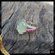 "Prehnite is a captivating gemstone with a soothing green color. Revered for its calming energy and ethereal glow, it promotes harmony and personal growth. Adorn yourself with nature's serene embrace. * Gemstone: Prehnite & Cubic Zirconia * Gem color: Green, White & Pink * Size: 10x14 mm * Weight: 5.45 ct. * Metal Purity: 925 Sterling Silver  * Usage: For Girls & women Jewels as Unique as You Are 💎💖 Keep Noted- All the products' photographs are taken under natural light or a flashlight. However, the color you see in the picture may be a little different compared with the real product. We always try our best to capture the photos so that you can get a clear view of the product ♥ If you require any other assistance, I would be more than happy to help you. ♥ If You Like Our Product, Please Spiritual Emerald Ring With Natural Stones For Gift, Handmade Green Spiritual Gemstones, Green Spiritual Gemstones For Gifts, Spiritual Green Gemstones For Gifts, Spiritual Green Gemstones For Gifting, Green Oval Crystal Ring With Natural Stones, Green Gemstones For May Birthstone Gift, Peridot Rings With Natural Stones For Gifts, Sterling Silver Emerald Ring With Gemstone