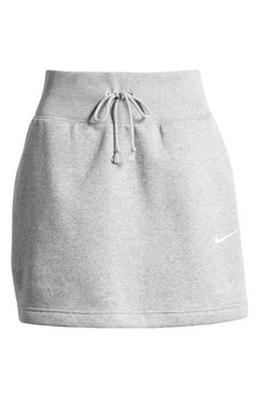 Midweight brushed fleece adds to the ultrasoft and comfortable feel of this sporty high-waist miniskirt popped with handy pockets and side slits. 16" center front length (size Medium) Elastic/drawstring waist Side-seam pockets Unlined 80% cotton, 20% polyester with 97% cotton, 3% spandex rib Machine wash, tumble dry Imported Straight Skirt, Drawstring Waist, Phoenix, High Waist, Mini Skirts, Nordstrom, High Waisted, Spandex, Size Medium