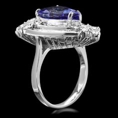 7.20 Carats Natural Very Nice Looking Tanzanite and Diamond 14K Solid White Gold Ring Suggested Replacement Value: Approx. $7,900.00 Total Natural Pear Shaped Tanzanite Weight is: Approx. 5.00 Carats Tanzanite Measures: Approx. 14.00 x 9.00mm Natural Round Diamonds Weight: Approx. 2.20 Carats (color G-H / Clarity SI1-SI2) Ring total weight: Approx. 8.2 grams Disclaimer: all weights, measurements and colors are approximate and may vary slightly from the listed dimensions or as seen in the image. Luxury Round Gemstones For Formal Occasions, Luxury Round Gemstones For Formal Events, Luxury Diamond Gemstones For Formal Occasions, Luxury Gia Certified Jewelry For Evening, Trillion Cut Halo Ring For Formal Occasions, Formal Trillion Cut Ring With Halo Setting, Trillion Cut Halo Setting Ring For Formal Occasions, Elegant Gia Certified Trillion Cut Ring, Luxury Pear-shaped Diamond Ring With 17 Jewels