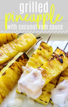 grilled pineapples with coconut sauce on a white plate and text overlay