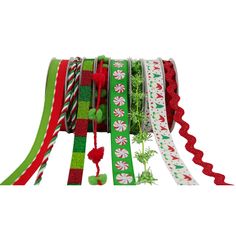 a roll of christmas ribbon with candy canes and poinsettis on it