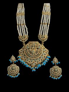 long rani haar with earrings and tika Made using Jadau pearls with turquoise beads and 22ct gold plating Traditional Turquoise Kundan Necklace For Festivals, Turquoise Kundan Bridal Necklace For Festive Occasion, Festive Turquoise Kundan Bridal Necklace, Traditional Turquoise Jewelry Sets For Festive Occasions, Festive Turquoise Bridal Necklace For Wedding, Festive Turquoise Bridal Necklace, Bollywood Style Turquoise Jewelry With Latkans, Turquoise Kundan Necklace For Festivals, Festive Turquoise Kundan Necklace For Wedding