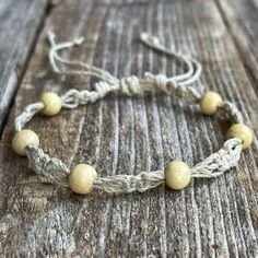 This hemp bracelet / anklet is made using 100% natural hemp cord. Designed for everyday wear.  It has an adjustable closure that will fit a 7-7.5 regular fit wrist. It also opens to around 13 inches to fit as anklet. Casual Braided Bracelets With Adjustable Length, Casual Braided Bracelet With Adjustable Cord, Casual Everyday Braided Bracelet With Adjustable Cord, Casual Bracelets With Adjustable Cord, Casual Everyday Braided Bracelets, Casual Adjustable Bracelet With Waxed Cord, Casual Braided Bracelet With Adjustable Clasp, Adjustable Beige Jewelry With Sliding Knot, Casual Waxed Cord Bracelets For Everyday