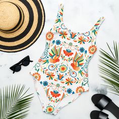 Mexican Otomi One-Piece Swimsuit - The Global Wanderer Tropical Multicolor Bodysuit For Pool, Summer Multicolor One-piece Bodysuit, Multicolor One-piece Bodysuit For Vacation, White One-piece Tankini For Beach Season, White Summer Swimwear For Festival, Playful White One-piece Swimwear, Summer Printed Bodysuit For Pool, Tropical White Sleeveless Tankini, Tropical Style White Sleeveless Tankini