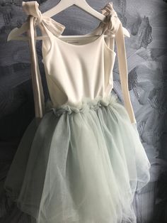 "A beautiful tutu dress great for any occasion! Birthday party, flower girl dress, ballet outfit or for dancing around at home!  Super soft jersey top fully lined with a soft tulle bottom. This dress has tie straps which makes it easy to adjust.  All dresses are made by hand by me only which makes each dress unique and one of a kind.  Please allow 1-2 weeks for production, dresses with intricate beading will take 3-4 weeks.  I am happy to make a custom order as well as add some sparkle or beadin Summer Ballet Tutu Dress For Dress-up, Sleeveless Tulle Tutu Dress With Bow, Fitted Sleeveless Tutu Dress With Bow, Tulle Tutu Dress With Bow For Dress-up, Spring Princess Tutu Dress With Bow, Spring Princess Style Tutu Dress With Bow, Spring Tulle Tutu Dress With Bow, Summer Garden Party Tulle Tutu Dress, Spring Sleeveless Tulle Tutu Dress