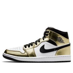 The Air Jordan 1 Mid SE ‘Metallic Gold’ is the perfect sneaker to add some luxury to your style. The white leather upper is contrasted by metallic gold overlays and black hits on the Swoosh and collar, creating a look that will turn heads. With Jumpman iconography woven into the tongue tag and classic Wings logo stamped on the lateral collar flap, this mid-top sneaker has all of the details covered. And don’t forget about the encapsulated Nike Air cushioning in the heel – it ensures a comfortable, luxurious ride. (AJ1/SNKR/Retro/Men's/High Top/Basketball) Low-top Leather Sneakers With Foil Embossed Logo, Leather Low-top Sneakers With Foil Embossed Logo, Metallic Leather Sneakers With Metallic Logo, Gold Sneakers With Contrast Sole For Streetwear, Sporty Custom Gold Leather Sneakers, Modern Metallic Sneakers For Streetwear, Sporty Gold Leather Custom Sneakers, Gold Low-top Sneakers With Contrast Sole, Metallic Leather Sneakers For Streetwear