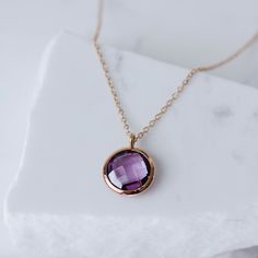 Amethyst necklace in 14K solid rose gold. A dainty natural purple amethyst necklace for women also available in yellow gold or white gold. It is the birthstone of February. The best gift for her. 100% handcrafted with love! D E T A I L S ● Metal: 14K solid gold, 14K white gold or 14K rose gold ● Gemstone: Amethyst, round briolette cut ● Stone Diameter: 10mm (0.4in) ● Length: 39cm (15.5in) to 47cm (18.5) H O W ∙ T O ∙ O R D E R Choose from the drop down menu the available options (Metal-Length) a Elegant Amethyst Birthstone Necklace, Classic Amethyst Necklace For Gift, Classic Amethyst Rose Gold Jewelry, Classic Rose Gold Amethyst Jewelry, Formal Purple 14k Gold Necklace, Fine Jewelry Purple Round Pendant Necklace, Purple Round Pendant Necklace In Fine Jewelry Style, Elegant Rose Gold Amethyst Necklace, Fine Jewelry Amethyst Round Pendant Necklace