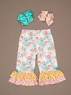 Cute Pink Pants For Spring, Cute Bloomers For Spring Playwear, Cute Bloomers For Playwear, Spring Season, Playful Floral Print Bottoms For Spring, Playful Floral Print Spring Bottoms, Cute Spring Bloomers, Playful Pink Bloomers For Spring, Cute Bottoms With Elastic Waistband For Spring, Cute Cotton Bloomers For Spring