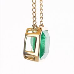 Take a glimpse of this stunning, emerald and diamond necklace. The featured stone is a large, Colombian emerald-emerald cut with 8.80-carats of pure beauty! The stone displays an enchanting medium-green color, with a minimal yellow hue. Bezel set, east to west, in 14K yellow gold. This pendant, is stationary with a diamond by the yard necklace, giving it so much more detail to this class solitaire. Diamond Necklace Solitaire, Emerald Diamond Necklace, Emerald And Diamond Necklace, Diamond By The Yard, Colombian Emeralds, Emerald Engagement, Silver Engagement Rings, Solitaire Pendant, Pure Beauty