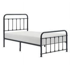 a metal bed frame with white sheets and black iron bars on the headboard, against a white background