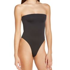 Frankies Bikinis Stella Strapless One-Piece Swimsuit In Black, Size Xs -Never Worn, Great Condition -Black -Size Xs Strapless Second-skin Seamless Bodysuit, Beach Bandeau Stretch Bodysuit, Beach Bandeau Bodysuit With Stretch, Shapewear Bandeau Swimwear With Built-in Bra, Seamless Beachwear Bodysuit For Sunbathing, Stretch Bandeau Bodysuit For Beach, Seamless One-piece Beachwear Bodysuit, Seamless Strapless Shapewear Swimwear, Seamless One-piece Bodysuit For Pool