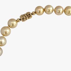 Indulge in the elegance and natural beauty of this stunning South Sea pearls necklace, featuring cultured Golden South Sea pearls sourced from Indonesia. Crafted with meticulous attention to detail, this necklace is a testament to exceptional craftsmanship and exquisite materials. Secured with a 14K yellow gold 'twist and lock' clasp, the necklace measures 17.25 inches (43.5cm) in length, draping gracefully around the neckline. The weight of 95.7g adds a substantial feel and underscores the luxu Fine Pearl Jewelry, South Sea Pearl Necklace, Golden South Sea Pearls, Pearls Necklace, Sea Pearl, South Seas, South Sea Pearls, Sea Pearls, Pearl Jewelry