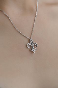 Beautiful Filigree Necklace with medieval symbol: The Fleur de Lys. The symbole of France and Quebec. Gift chain included. Necklace is silver 925 and it has 45cm long. Silver Fleur de Lys Necklace, Fleur de Lis, French Royalty Necklace, Jewelry Lys of Quebec, Quebec Jewellery, Jewel symbole of France Lovely option for anniversary or birthday gift. *Jewels for good luck* ✨ D I M E N S I O N S & V A R I A T I O N S✨ The diameter of the pendant is 0.8 inches (20 mm) and the height is 0.9 in (22 Medieval Metal Pendant Necklaces, Medieval Style Metal Pendant Necklaces, Medieval Metal Pendant Necklace, Medieval Sterling Silver Necklace In Silver, Medieval Style Metal Engraved Necklaces, Medieval Engraved Cross Pendant Jewelry, Medieval Silver Cross Pendant Jewelry, Medieval Sterling Silver Pendant Jewelry, Medieval Sterling Silver Jewelry Gift