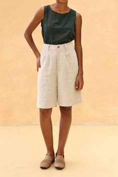 The linen loose-fitted knee-length shorts offer a comfortable and casual fit, perfect for warm days. Handcrafted in our studio to your measurements and preferences, available in over 60 colors. DETAILS - 100 % linen, medium weight (200gsm), free-shrinkage, amazingly soft feel - Knee-length shorts; different length is possible - Loose fit - High waisted - Pleated front - Front button and zipper - Inseam pockets - Custom made pants, FREE customizations; simply let us know your needs (hem length, fit style, leg opening width, belt, etc.). - Handcrafted in our studio, French seams, clean and meticulous COLOR - The color shown is Beige. - Available in over 60 colors, choose color in the color chart in the listing. - Link of fabric samples available here: https://madebygaiavn.etsy.com/listing/13 Linen Bermuda Shorts With Built-in Shorts And Relaxed Fit, Beige Linen Shorts For The Beach, Beige Linen Shorts For Beach, Relaxed Fit Linen Bermuda Shorts, Wide-leg Linen Shorts With Pockets, Beige Linen Bermuda Bottoms, Wide Leg Linen Shorts With Pockets, Knee-length Bottoms With Built-in Shorts For Vacation, Linen Bermuda Shorts For Summer