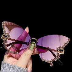 Rimless Oversized Butterfly Sunglasses Jeweled Fashion Accessory Teens Women Holiday Gift  Low Cost/ High Value Holiday Gift.  I gave a pair to my doctor and he  (yes, he)  walked around the office wearing them all day.  That's how much they are loved! PLEASE NOTE!!  i HAVE MARKED THESE DOWN 25% FOR THE HOLIDAYS AND YOU CAN STILL GET THEM  BEFORE IT'S TOO LATE.  ORDER YOURS NOW BEFORE I RUN OUT. HURRY ONLY 3 LEFT!  THERE IS STILL TIME TO RECEIVE YOUR FABULOUS BUTTERFLY SUNGLASSES BEFORE CHRISTMA Silhouette Frames, Diamond Butterfly, Metal Glasses, نظارات شمسية, Butterfly Sunglasses, Butterfly Frame, Luxury Diamonds, New Glasses, Cool Sunglasses