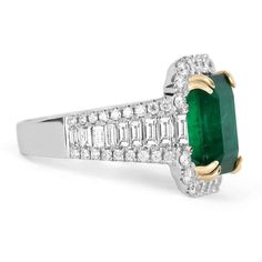 For Sale on 1stDibs - An exceptional Colombian emerald & diamond statement/anniversary ring. This fine quality ring is captivating from every angle. Incredible diamonds highlight Luxury Emerald Ring For Anniversary, May Birthstone, Luxury Emerald Cut Emerald Cluster Ring, Luxury Vvs Clarity Emerald Ring For May Birthstone, Luxury Gia Certified Emerald Ring For May Birthstone, Luxury Emerald Cut Emerald Ring With Center Stone, Luxury Moissanite Emerald Ring For Anniversary, Luxury Emerald Ring With Diamond Accents For Anniversary, Exquisite Baguette Cut Emerald Ring For Anniversary, Luxury Baguette Cut Emerald Ring With Center Stone