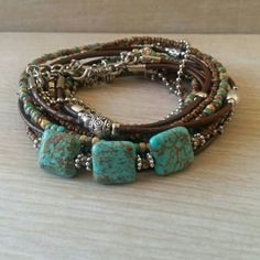 Boho Multi Strand Leather Wrap Bracelet Turquoise by DesignsbyNoa Turquoise Hand-wrapped Hippie Beaded Bracelets, Adjustable Turquoise Bohemian Wrap Bracelet, Adjustable Bohemian Turquoise Wrap Bracelet, Earthy Turquoise Bracelets For Festival, Bohemian Turquoise Beaded Bracelets, Bohemian Brown Bracelets, Turquoise Hippie Beaded Bracelets For Jewelry Making, Turquoise Hippie Bracelets As Gift, Adjustable Turquoise Wrap Bracelet For Festival