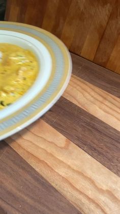 a bowl of soup is sitting on a table