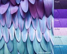 the color scheme for feathers is purple, blue, and green with different colors on them