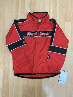 Reebok Windbreaker Jacket Fleece Lined Red Hooded Boys Size 5/6. Condition is New with tags. Shipped same or next business day via USPS First Class Mail. Check out more great items in my store! Retro Red Hooded Windbreaker, Red Hooded Nylon Windbreaker, Sporty Red Windbreaker With Double-lined Hood, Red Retro Windbreaker With Pockets, Red 90s Long Sleeve Windbreaker, Windbreaker Jacket, Adidas Jacket, Motorcycle Jacket, Athletic Jacket