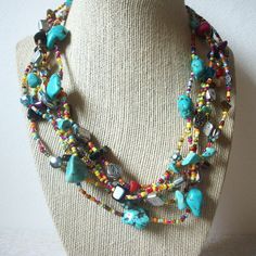 - Vintage Necklace - Turquoise Faux Stone chips - Stones and metal in silver Bali - Glass Seed beads - Multi strand - 18" - 21" long Beautiful necklace! Please see my other listings for more vintage jewelry- I am happy to combine the shipping. Thanks so much!  Beautiful necklace! Please see my other listings for more vintage jewelry- I am happy to combine the shipping. Thanks so much! Southwestern Style Multicolor Necklace For Beach, Multicolor Beaded Turquoise Necklace For Jewelry Making, Nickel Free Multicolor Bohemian Beaded Necklaces, Bohemian Multicolor Turquoise Necklace With Round Beads, Multicolor Bohemian Turquoise Necklace With Round Beads, Nickel Free Multicolor Beaded Necklace For Festivals, Bohemian Multicolor Turquoise Beads Necklace, Bohemian Multicolor Turquoise Beaded Necklace, Southwestern Turquoise Necklace With Colorful Beads For Festival