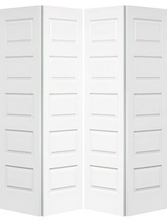 two white doors with shutters on each side