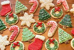 decorated christmas cookies on a wooden table