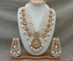 Beautiful kundan necklace set with danglers. The necklace is adjustable to your desired length with rope dori. Perfect for wedding, engagement, parties or special occasions. The set is beautifully designed to complement any outfit, adding a touch of elegance and sophistication to your look.  The necklace set makes for an ideal gift for yourself or a loved one. All the raw material used in this product is of high quality and is handcrafted with love. Color, shades, texture displayed may slightly vary from the actual product due to digital image limitations. Care: It is advisable that you keep our products away from water, perfume, direct heat, humidity and other chemicals. Clean it with soft cloth. Contact us for any question or live video of the necklace set. Kundan Long Necklace, Long Necklace Set, Kundan Necklace Set, Engagement Parties, Kundan Necklace, Kundan Necklaces, Kundan Jewellery, Brass Jewelry, Raw Material