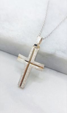 An elegant handmade mens gold cross 14k - 18k A Handmade Solid Gold Cross Pendant from 14k or 18k Gold. A unique jewelry ideal for baptism cross. Α jewel for a lifetime. Handmade in Greece in our laboratory in Sparta. -It can be personalized by engraning on the back side of the cross a name or a date- Details: Height29 mm Width:15 mm Weight:Approximately 5.0 gr 14k - 5.5 18k Metal:14k White Gold Style:Mens Baptism Cross ❣️ For more  crosses take a look here      👉  https://www.etsy.com/shop/Gio Men’s Gold Cross Necklace, Cross-shaped Large Pendant Jewelry For Gift, Cheap Men's Cross-shaped Jewelry, Nickel-free White Gold Cross Pendant Jewelry, Gold Cross Necklace Mens Jewelry1000.com, Gold Cross Pendant, Mens Pendant, Mens Gold, Gold Cross