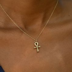 The Story A timeless icon, the Ankh is an ancient Egyptian symbol meaning life. Made from solid 14 karat yellow gold the open design is a perfect talisman. Measuring 0.87 inches tall, it's not too small and not too big, the perfect size for everyday wear. A great charm to add to your charm bracelet, wear as a necklace, or stacked with your favorite pieces. How do you want to wear your new charm? Choose a 16” or 18” chain, or just the charm itself. The Specs Style Number: R3402 Vintage, circa mid Spiritual 14k Gold Jewelry Stamped 14k, 14k Yellow Gold Cross Pendant Charm Necklace, Spiritual 14k Gold Cross Jewelry, Symbolic Engraved Brass Jewelry, Antique Engraved Jewelry For Good Luck, Symbolic Etched Jewelry For Blessing, Gold 14k Cross Pendant Charm Necklace, 14k Gold Cross Pendant Charm Necklace, Spiritual 14k Stamped Pendant Jewelry