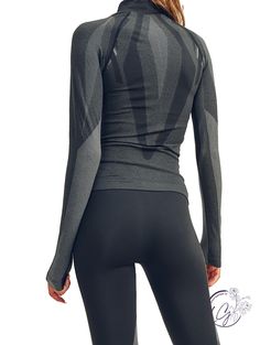 Seamless technology. Moisture-wicking. Four-way stretch. Full zip jacket. Machine wash cold (Gentle cycle), Tumble dry low or Hang Dry (recommended). Inseam: Small: 26.6" Medium: 27" Large: 27" Fabric: 92% Polyester & 8% Spandex **THIS ITEM IS A FINAL SALE ITEM. NO RETURNS OR EXCHANGES ALLOWED** High Stretch Black Tops For Outdoor Activities, High Stretch Black Top For Outdoor Activities, Black High Stretch Tops For Outdoor Activities, Snug Fit Sports Tops For Winter, High Stretch Winter Sports Activewear, Athleisure Long Sleeve Activewear For Winter Sports, Technical Winter Training Tops, Black Stretch Top For Outdoor Activities, Snug Fit Winter Sports Activewear