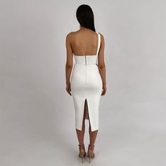 Our Style No.SW668890%Rayon. 9%Nylon. 1%SpandexMade in ChinaVery StretchyGentle Dry Clean Only Sleeveless White Fitted Bodycon Dress, White Sleeveless Bandage Dress For Night Out, White Sleeveless Stretch Bandage Dress, White Sleeveless Bandage Dress For Cocktail, White Sleeveless Bandage Cocktail Dress, Elegant Sleeveless Elastane Bandage Dress, White Fitted Midi Dress For Club, White Sleeveless Stretch Midi Dress, White Sleeveless Bandage Dress For Party