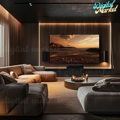 a living room with couches and a large television on the wall in front of it