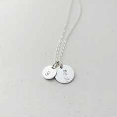 A sterling silver birth flower necklace that you can personalise! Choose your birth flower on one disc and an initial for the second one. The tiny initial disc pendant sits beside the larger flower one and they hang from a fine sterling silver chain.  Each birth flower necklace comes with an elegant card, featuring a vintage illustration and details about what the flower represents. A subtle botanical piece of jewellery, inspired by a love of nature. DIMENSIONS: Pendant: 12mm. Chain: 16-18" / 41 Metal Clay Designs, Flower Necklace Silver, Delicate Silver Necklace, Initial Disc Necklace, Birth Flower Necklace, Treasure Jewelry, Silver Birthday, Silver Flower Necklace, Elegant Cards