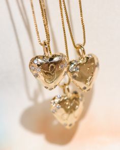 This sweet little 14k gold loveletter heart pendant is customizable with your very own initial or that of your beloved, with delicate little Diamonds kissing the edges. See attached photos for font example with your custom engraved initial. Set on a 16" or 18" delicate 14k chain in your choice of Box chain or Singapore chain. (see attached photo for examples) 💌 Please write desired length (16" or 18") in *Notes* section at checkout *Diamonds are stones of enlightenment, clarity of mind, imagination and inventiveness, fearlessness and the purity of love. Long valued for their magical properties and believed to have fallen from the sky after a battle between dragons, Hindus, over fifteen centuries ago, believed they provided their keepers with protection, courageousness, victory and the enh Personalized 14k Gold Initial Necklace For Anniversary, 14k Gold Heart Charm Necklace For Wedding, 14k Gold Initial Necklace For Anniversary, 14k Gold Charm Necklace With Heart And Initial Pendant, Yellow Gold Initial Necklace For Anniversary On Valentine's Day, Personalized Yellow Gold Heart Pendant Charm Necklace, Yellow Gold Initial Necklace For Anniversary And Valentine's Day, Gold Heart Pendant Necklace With Initials, 14k Gold Charm Necklaces For Anniversary, Valentine's Day