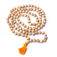 PRICES MAY VARY. SPECIFICATIONS: This authentic Tulsi Kanthi beads Necklace is Handmade, Sewn into a Garland with a Heavy Duty Thread. It has 108 + 1 guru beads. This Healing Rosary Spiritually Energized Mala Tulsi (Tulasi) Japa Mala or Holy Basil Wood Mala made from Hand Carved, Very light brown wood beads. ORIGIN: The name "Tulasi" means "She Who is Incomparable”. Tulasi, Tulsa or Vrinda Devi, the Goddess of Vrindavana. Tulsi also has Medicinal Properties – It is considered Divine and used for Yellow Spiritual Beaded Necklace With Gemstone Beads, Handmade Temple Jewelry Beads For Rituals, Spiritual Round Beads Mala For Puja, Spiritual Mala With Round Beads For Puja, Spiritual Mala For Puja With Round Beads, Healing Mala With Round Beads For Festivals, Round Beaded Bracelets For Meditation And Festivals, Traditional Ritual Gemstone Beaded Necklaces, Spiritual Beaded Necklaces With Polished Beads For Festivals