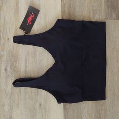 Size: S Shoulder To Hem: 15.5" Pit To Pit: 14.5" Condition: Nwt, No Rips, No Stains, From Smoke Free Home. Flat Lay Measurements. Ships Within 24 Hrs Except Weekends! I Love Offers! Black Stretch Crop Top With Built-in Bra, Black Tank Top With Built-in Bra For Workout, Black Workout Tank Top With Built-in Bra, Black Sports Bra With Built-in Bra And Medium Support, High Stretch T-back Tops For Sports, Black Seamless Athleisure Tank Top, Black Sporty T-back Activewear, Black Sports Bra With Built-in Bra For Yoga, Black Seamless Tank Top For Workout