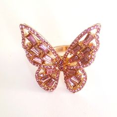 Brand New Pink Rhinestones And Gold Color Butterfly Adjustable Band Ring. Never Used, Clean, Mint Condition. Message Me With Any Questions. See All Of My Other Items For Sale. Thanks For Visiting. Pink Ring With Sparkling Stones, Trendy Pink Butterfly Jewelry, Trendy Pink Rhinestone Jewelry, Trendy Pink Cubic Zirconia Jewelry, Pink Rhinestone Rings For Gifts, Pink Cubic Zirconia Party Rings, Pink Crystal Ring For Gift, Pink Rhinestone Party Rings, Pink Party Rings With Rhinestones