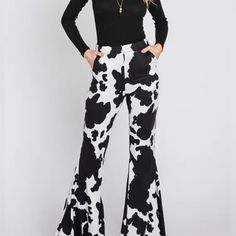 Brand New With Tags Black Cowprint Flare Pants White Printed Wide Leg Pants, Chic White Printed Bottoms, Chic Printed Trousers, Chic High-waisted Printed Pants, Chic Printed Long Pants, Chic Printed Workwear Pants, Chic Black Printed Pants, White Stretch Printed Pants, Trendy Fitted Printed Pants