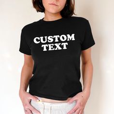 Custom Text Baby Tee, Aesthetic Tee, Women's Fitted Tee, Unisex Shirt, Trendy Top, Y2K Gift for Her, Personalized Retro 90s Style The first model is wearing a Baby Tee XS size. DETAILS - 100% cotton (fiber content may vary for different colors) - tear-away label  SIZING Sizes vary by shirt style. Please check the size chart before making your purchase. PLEASE NOTE: Our Baby tee is sized for a youth, reminiscent of the '90s-era shrunken-down T-shirt. This style, popularized by the skater/raver cu Baby Tee Aesthetic, 90s Era, Trendy Top, Fitted Tee, Baby T Shirts, 90s Style, Limassol, Retro 90s, Retro Stil