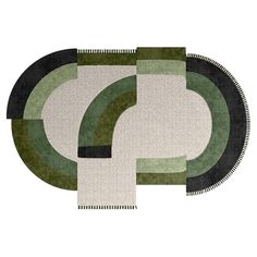 two rugs with different colors and shapes on them, one in green and the other in black