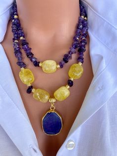 Raw Amethyst and Citrine Layered Necklace Set with Agate Pendant This elegant necklace set is a great gift for yourself and your loved ones. Made from natural crystal beads. All metal ornaments are gold plated and won't get darker in time! FREE SHIPPING - All orders get shipped within 1-2 business days. - 5-10 days of delivery time Returns are allowed 14 days after the delivery, however, the cost of delivery lies on the buyer. For more bracelets and necklaces!: https://finecrystalsdesign.etsy.co Yellow Double Strand Jewelry As Gift, Yellow Double Strand Jewelry For Gift, Yellow Gemstone Beaded Necklaces As Gift, Yellow Gemstone Beaded Necklace For Gifts, Yellow Amethyst Jewelry Gift, Yellow Crystal Gemstone Bead Necklace For Gifts, Amethyst And Citrine, Unique Statement Necklace, Ocean Inspired Jewelry