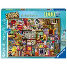 a puzzle box with many different items on the top and bottom, including an image of a